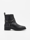 BOTÍN NEGRO CON TIRAS Y TACHAS